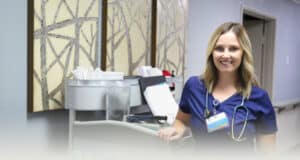 A nurse at her cart at Hanford Post Acute