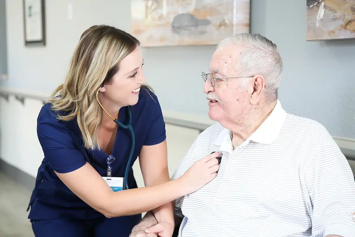 yolo-300x200-85 A nurse and a patient at Hanford Post Acute